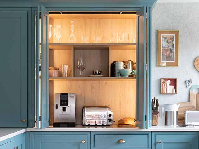 https://www.goodhomesmagazine.com/wp-content/uploads/2022/03/kitchen-coffee-station-in-a-real-home.jpg
