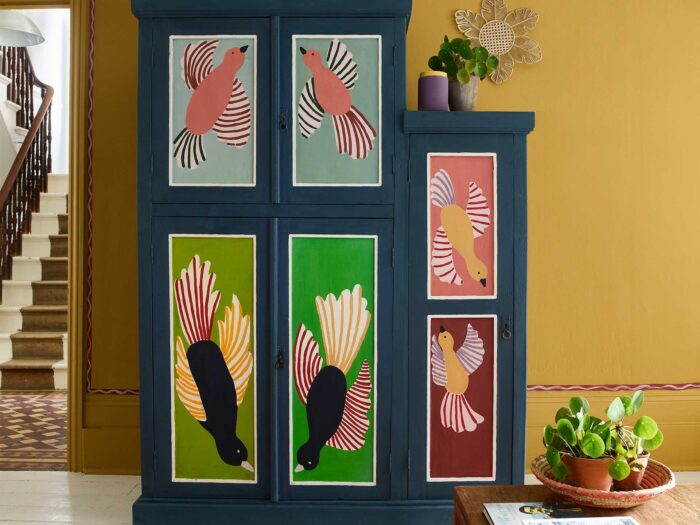 A vibrant folk mural can be used on walls bring a room to life