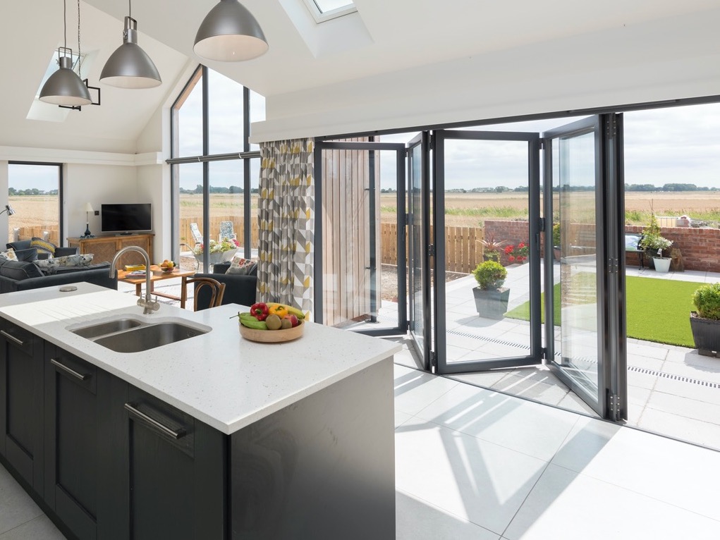 Bi-fold doors opening out to a patio