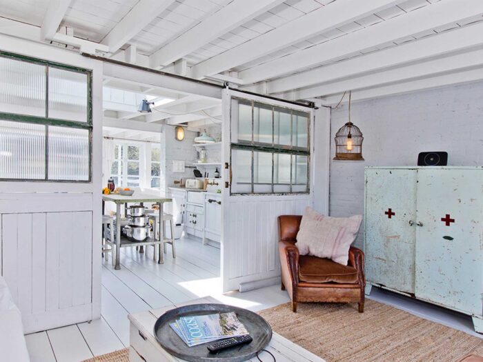 The all-white interiors of the White House at Camber Holiday Cottages