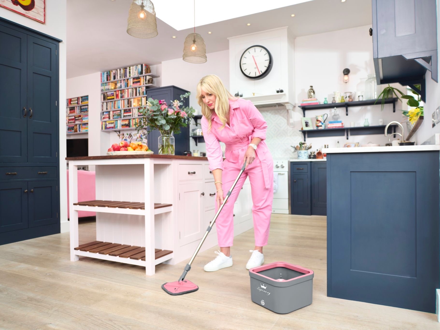 Lynsey Crombie Queen of Clean mopping kitchen floor