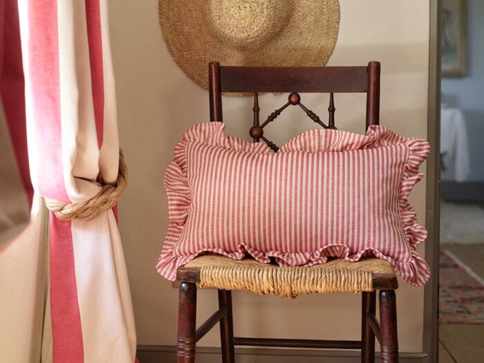 A striped cushions with frills is an easy summer accessory update