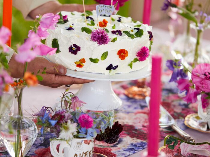 Use edible flowers to do the talking on a showstopper cake for a summer garden party