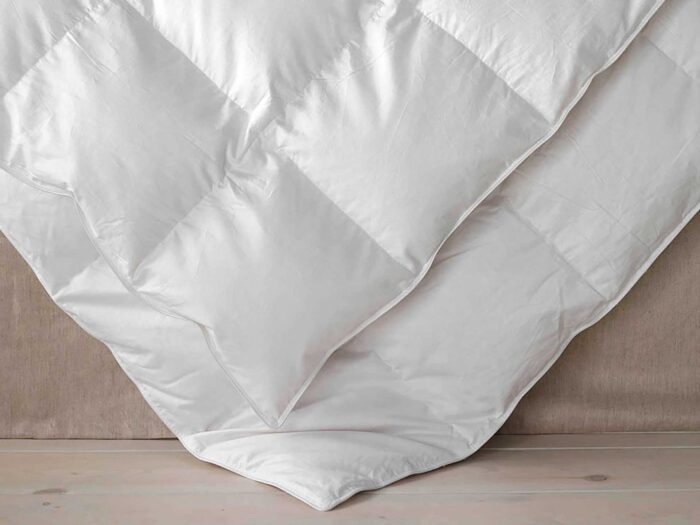 Switch your heavyweight tog duvet to something lighter for the summer