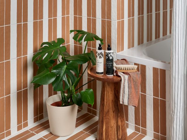 Striped tiles in a bathroom from Ca' Pietra