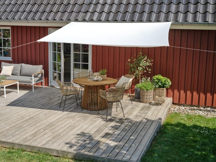 Garden decking with sail shade cover