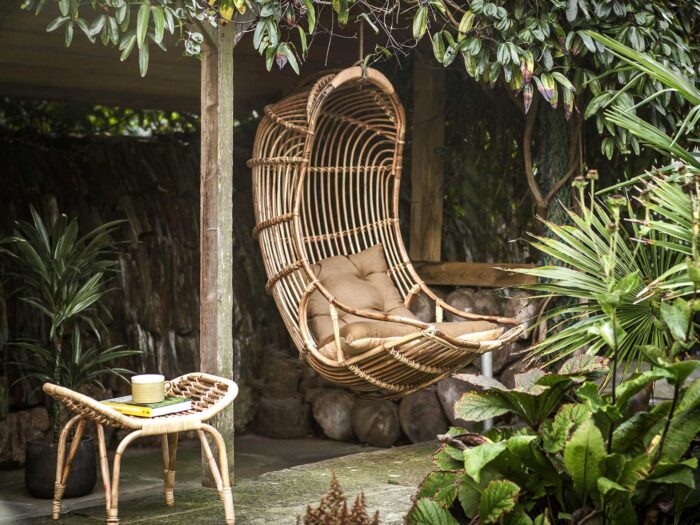 Imagine retreating to this relaxing rattan chair to read in the garden