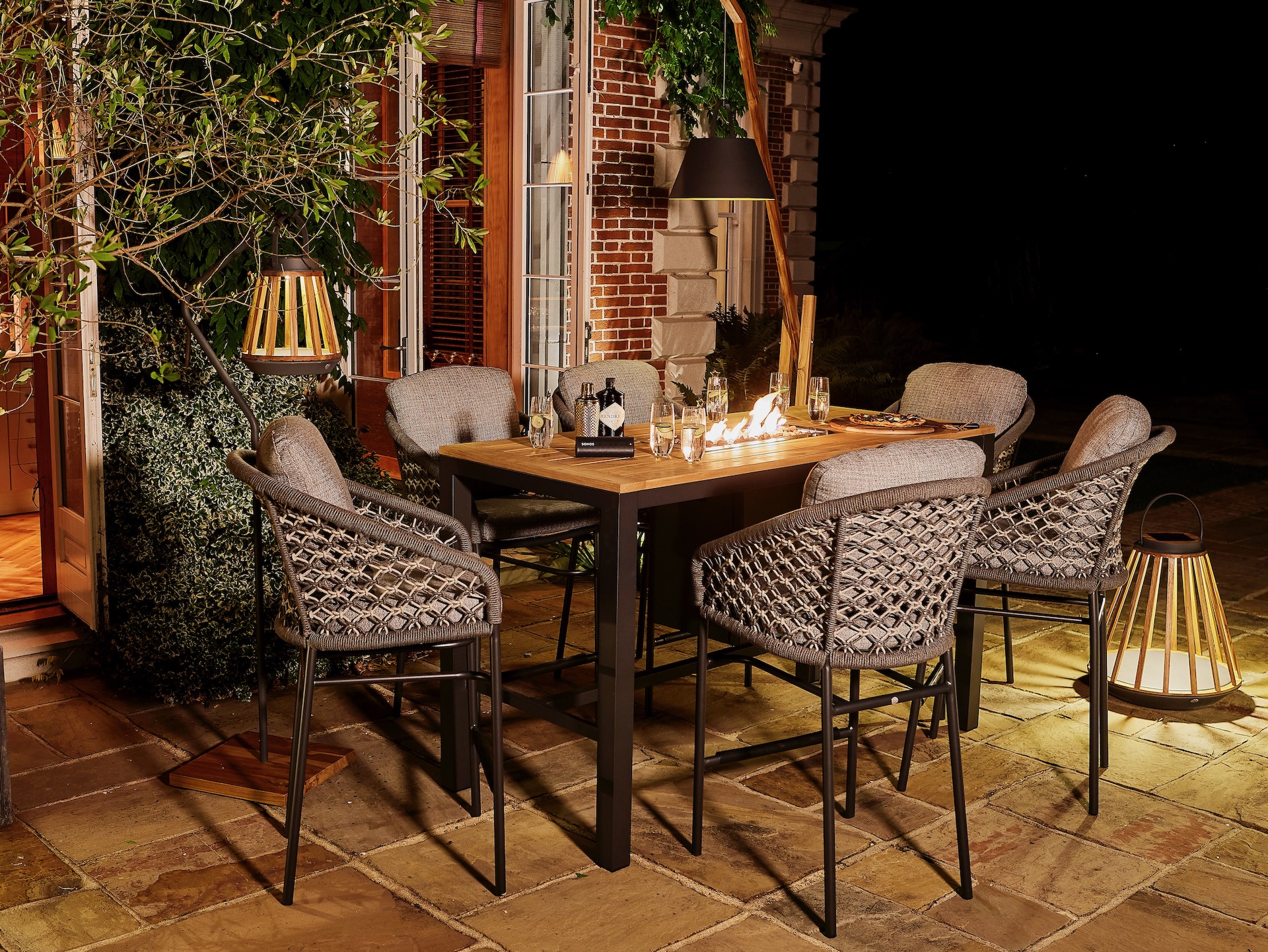 Bar table with fire pit on outdoor veranda 