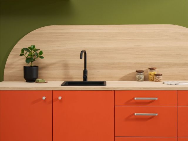 Retro kitchen,orange cabinet wth olive wall