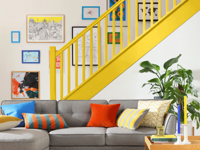 Bright yellow bannisters can bring a pop of colour to your staircase decorating ideas