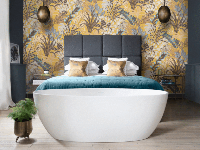 Having the bath at the end of the bed will add a hotel feel to your bedroom