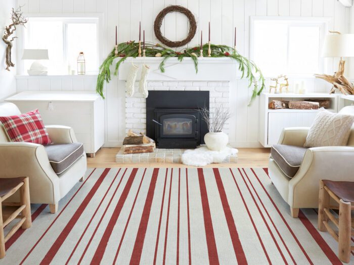 Living room with a large striped rug 