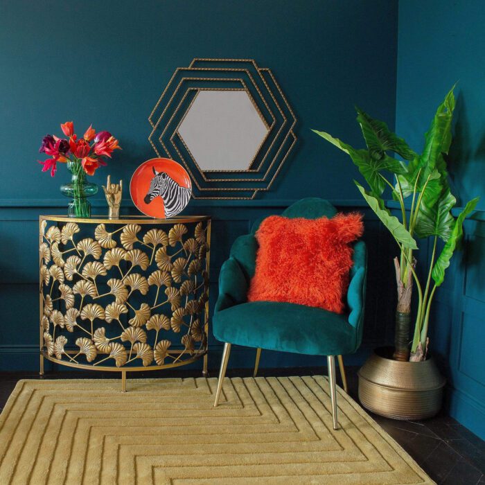 A room with a mustard coloured textured rug