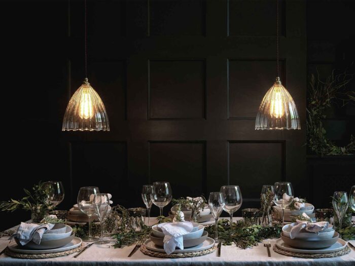 Go for a dark and elegant theme for your autumn tablescape strewn with natural foliage