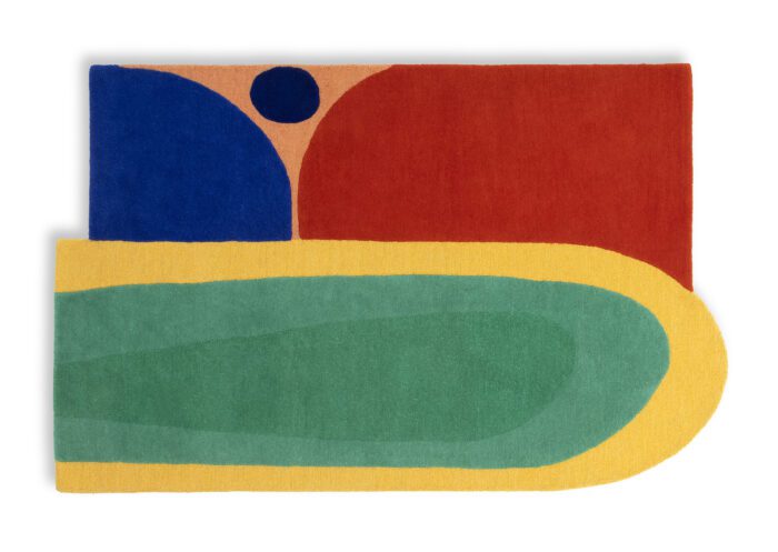 An irregular shaped multicoloured rug