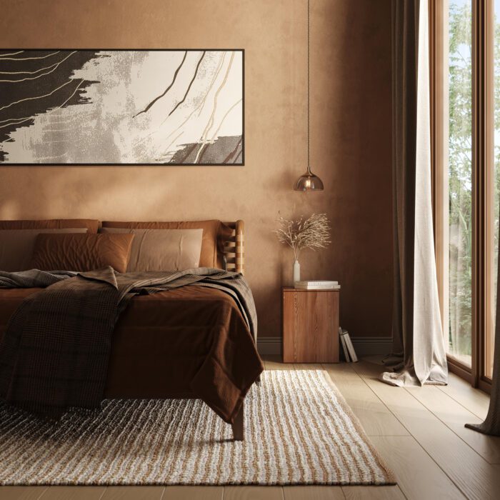 A bedroom with a large brown rug