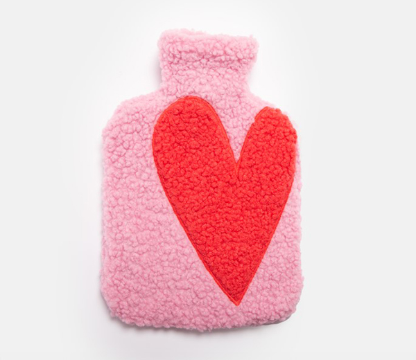 Pink borg water bottle with applique heart on white background