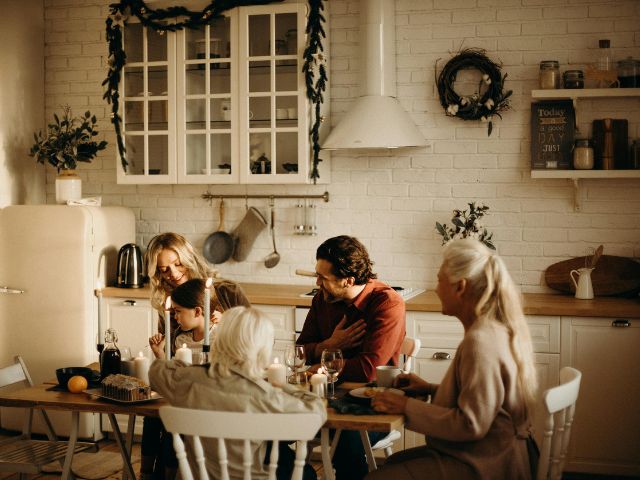 Family having dinner kitchen Christmas