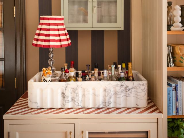 Marble sink on a Mustard Made cabinet