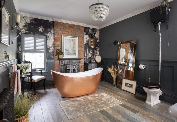 Giving up a bedroom to create a stunning family bathroom decorated in copper and black tones with personalised artwork, underfloor heating and quality sanitaryware was an easy decision for Hayley Lees.